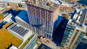 Top-down image of Parcel 4's ongoing construction, nestled within the bustling Harbor Point district in Baltimore.