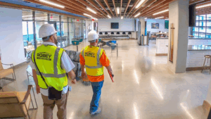 Robey Drywall contractors performing a final walk-through