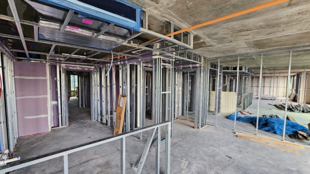 Commercial metal stud framing by Robey Drywall.